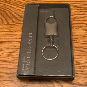 Kenneth Cole Sleek silver Key fob NEW Stunning